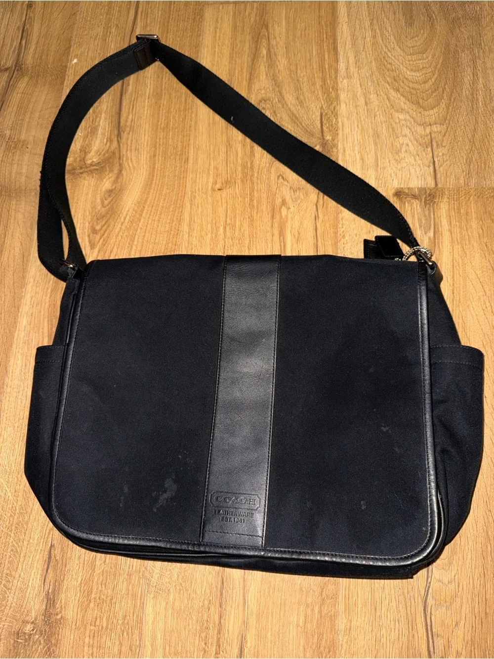 Coach leather trim messenger bag
